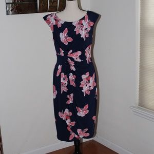 Next UP, sleeveless floral Navy blue  Faux wrap dress .....